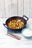 Sweet and sour chicken with broccoli and pepper (Asia)