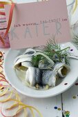 Rollmops with dill and onions