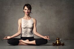 A woman meditating in a yoga position