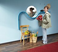 Woman standing in front of DIY shelf made from curved MDF panel