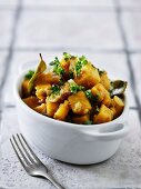 Fried potatoes with bay leaves and parsley