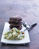 Burgers with a black salsify medley