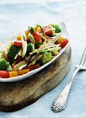 Mixed vegetable salad with turkey breast strips