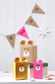 Various Christmas gift boxes with bear motifs