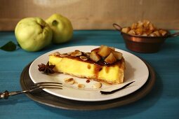 Cheesecake with almonds and quince sauce