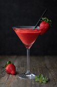 Strawberry daiquiri in a stemmed glass
