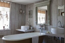 Vintage-style bathroom with board walls