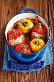 Peppers filled with rice and minced meat in tomato sauce