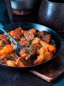 Beef ragout with vegetables in a pan