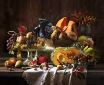 An autumnal arrangement featuring vegetables, mushrooms and fruit