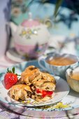 Earl Grey scones with raisins, clotted cream and strawberry jam
