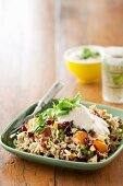 Pilaf with pumpkin, cranberries and pistachios