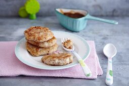 Semolina and almond fritters with dried plums