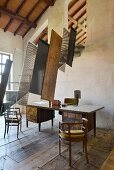 Desk below staircase with unusual balustrade