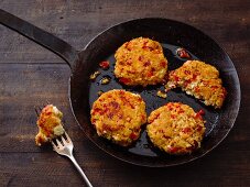 Sheep's cheese fritters with oats and red peppers