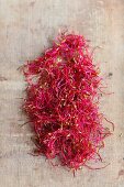 Beetroot sprouts on a wooden surface