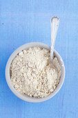 Oatmeal in a white porcelain bowl