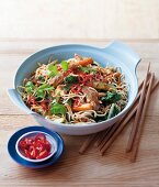 Egg noodles with pork, vegetables and peanut sauce (Asia)