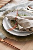 Christmas place setting with cloth napkin and ribbon