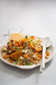 Bulgur and chickpea salad with pumpkin and a physalis dressing