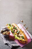 Vietnamese fish rolls with shallots and coriander vinaigrette in a baguette
