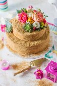 Russian honey cake with decorated with colourful flowers