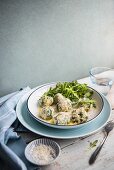 Spinach and ricotta gnocchi with Parmesan cheese and rocket