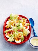 Bacon and egg salad with avocado dressing