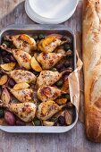 Chicken legs with lemon, shallots and olives