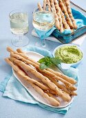 Grissini sticks with broad bean dip