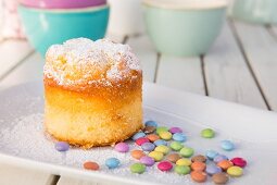 Vanilla cake with colourful chocolate beans