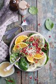 Colourful grapefruit salad with sesame seeds and beansprouts
