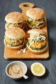 Fish burgers with coleslaw and a cold spinach sauce