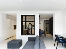 View from living room into kitchen through knocked-through wall