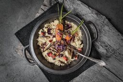 Strawberry risotto with spring vegetables and grasshoppers