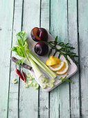 Ingredients for the five tastes for making green smoothies on a chopping board