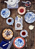An East Frisian teatime meal with a waffle heart, blueberries and tea