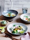 Egg hoppers with green sambol and coconut