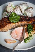 Grilled salmon with herb butter and potatoes
