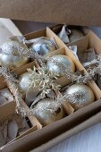 Box of antique Christmas baubles