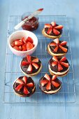 Biscuts with strawberry jam and chocolate