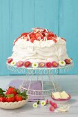 Pavlova with cream and strawberries