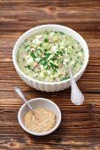 Okroszka - cold soup with cucumber, chives, mustard, ham and kvas (Russia)