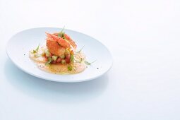 King prawns on a vegetable salad and melon carpaccio