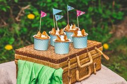 Butterfly cupcakes on a picnic basket