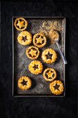Christmas mince pies on a metal tray