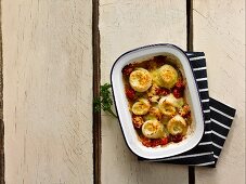 Brill rolls with a caerphilly and tomato bake