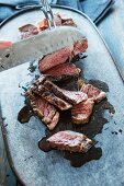 Grilled Mexican steak being sliced