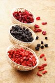 Dried goji berries, aronia berries and cranberries