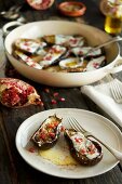 Gratinated mini aubergines with pomegranate seeds (Middle East)